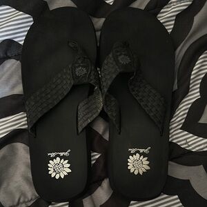 Women’s black YellowBox Flip Flops